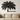 Large palm tree metal wall art above a sofa