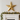 Gold metal star holiday wall ornament over fireplace
