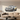 Large metal Lightning McQueen silhouette hanging above a child's bed in a colorful room