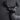 Close-up of a black metal deer wall sculpture showing intricate laser-cut details and shadow play
