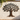 Outdoor patio wall featuring metal tree of life wall art with ivy and warm sunshine