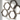 Geometric iron wall sculpture with shadow patterns on a white wall