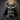 Metal Darth Vader silhouette wall art on a dark accent wall