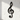 Metal music note wall decor above sofa in living room