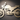 Metal motorcycle wall art silhouette against dark wall with dramatic lighting