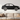 Metal car silhouette wall art in living room