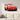 Lightning McQueen metal wall art in a living room