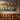 Metal KISS band logo wall art on a living room wall above a sofa