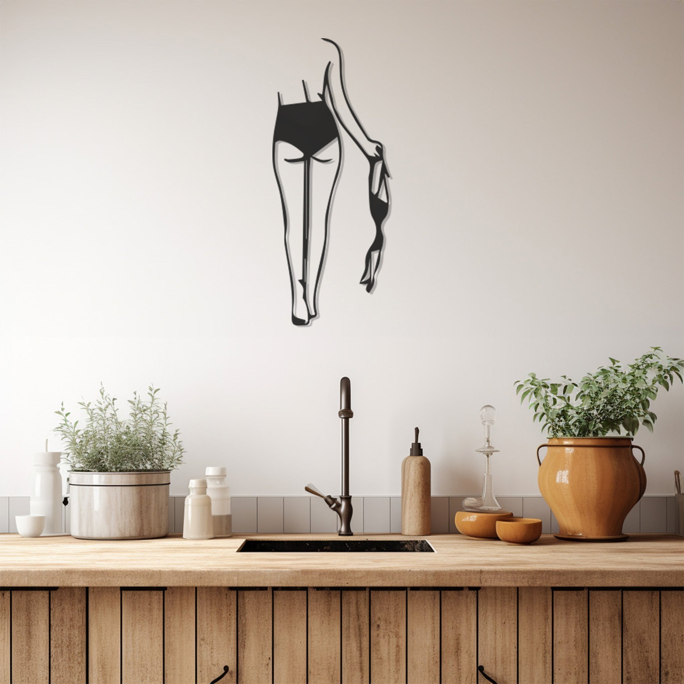 Metal Wall Decor With A Nude Female Figure Walking With A Bra In Her Hand Drawn With Line Art Technique