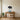 Bison silhouette above a living room sofa