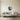 Astronaut wall art hanging above a bed in a bedroom