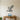 Black Bald Eagle Landing on a Branch Metal Wall Art on a light wall