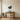 Bird nest with eggs metal wall art hanging on a living room wall