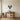 Menorah wall art hanging above a sideboard in a living room