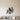 Black steel cardinal on a berry branch wall art