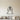 Black Champagne Flutes Raised in a Toast Metal Wall Art on a light wall