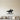 Black steel silhouette of a cowgirl on a galloping horse