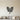 Sage metal wall art with two crossed sprigs of rounded leaves
