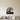 Black steel curling ocean wave wall art