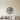 Black steel dartboard with darts in the bullseye