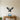 Geometric bald eagle diving with wings raised and talons out