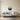 Downtown Skyline with Lit Windows Metal Wall Art hung in a home office