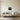 Drum kit metal wall art hanging above a bed in a teen bedroom