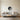 Faceted yin yang wall art above a bed