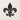 Front view of the fleur de lis silhouette design on a plain wall