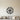 Four leaf clover metal wall art in black on a light wall