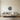 Peony ring wall art hanging above a dresser in a bedroom