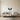 Geometric angel wings above a bed