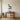 Geometric goose wall art on a kitchen wall above a shelf