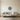Star mandala wall art above a bed
