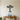Geometric studio microphone on a stand with sound waves on both sides