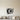 Geometric vinyl record coming out of its sleeve with a tonearm on the grooves
