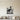 Black steel heron and cattails wall art