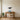 Humpback whale and calf metal wall art hanging above a crib in a nursery