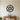 Black metal wall art of overlapping oval loops inside a thick ring