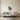 Interlocking gears wall art above a home office desk