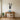 Jazz saxophone wall art on a living room wall next to a record shelf