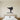 Black steel silhouette of a martial artist throwing a high kick