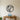 Leaping tarpon metal wall art inside a round steel ring