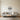 Lotus circle wall art above a bed