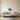 Steam train metal wall art above a desk in a home office