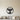 Black steel phoenix rising with spread wings inside a round ring