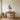 Geometric rabbit wall art above a crib in a nursery