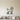 Black metal wall art of a standing poodle outline in profile