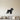 Black metal wall art of a standing schnauzer in side view