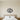 Sun, moon and stars metal wall art with a crescent moon beside a rayed sun